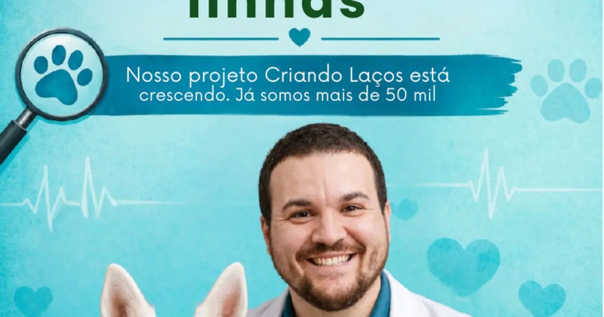 Victor Costa de jaleco com um cão branco e um gato preto